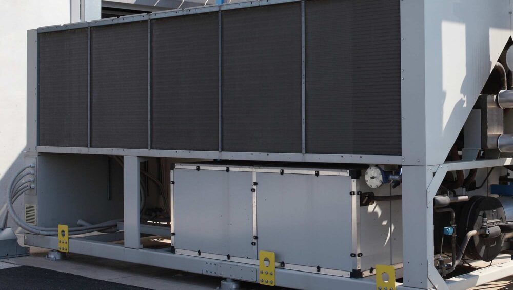 Air Handler Unit | Air Handerl Unit on concrete floor | Greenwood Plumbing & Heating Air Conditioning & HVAC